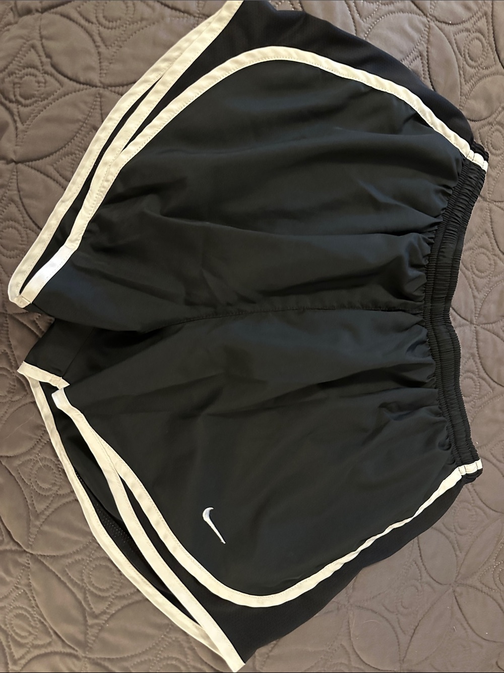 Nike lined Black Athletic Shorts with White Trim